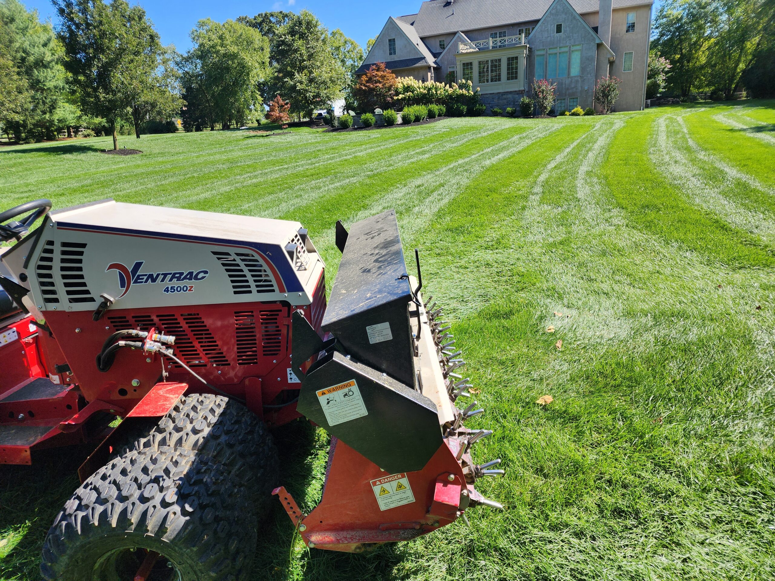 The picture shows a core aerator that DTL Total Turf Care uses for core areations.